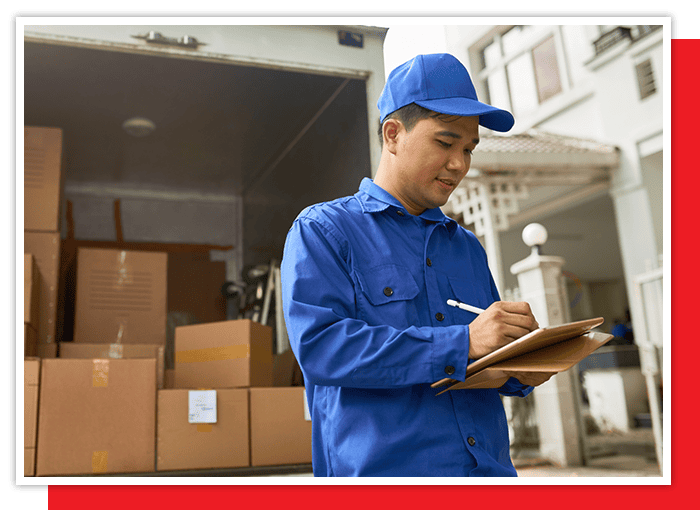 image of a mover looking at a clipboard